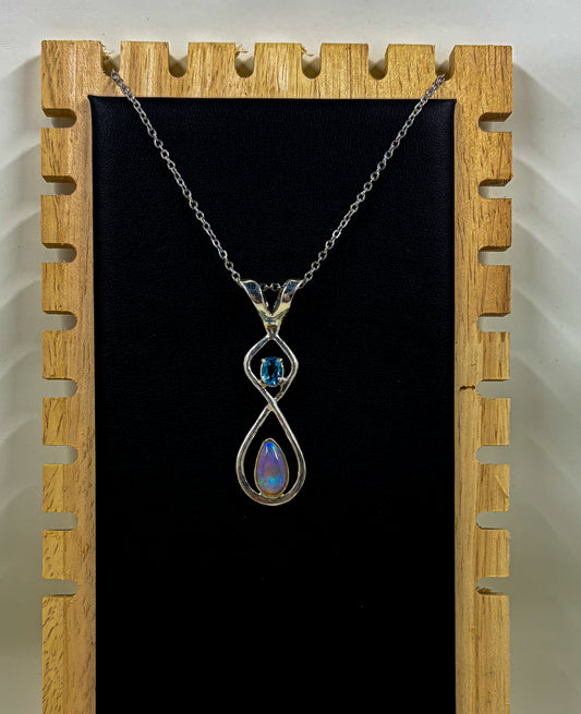 Lightning Ridge Crystal Opal and Swiss Blue Topaz .925 Silver pendant